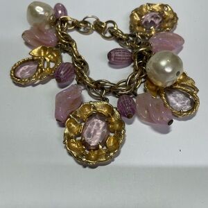 Gold and Pink Charm Bracelet with Ornate Details